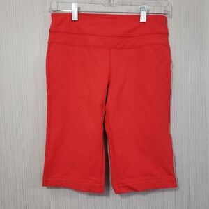 PrAna orange biker shorts / knee length athletic shorts woman's size small